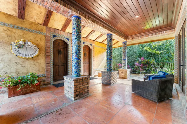 a view of a building with sitting area