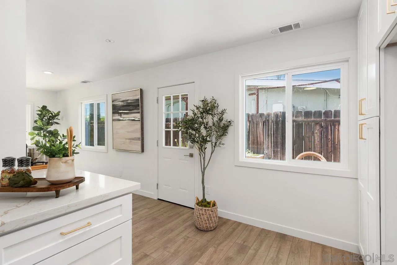 12914 Morene Street Poway, CA 92064 - Photo 11 of 40 a view of living room filled with furniture and wooden floor