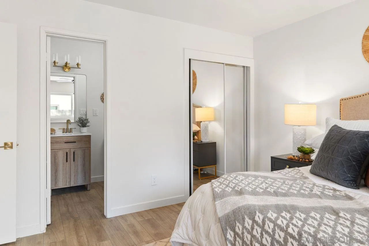 12914 Morene Street Poway, CA 92064 - Photo 19 of 40 a bedroom with a bed and closet