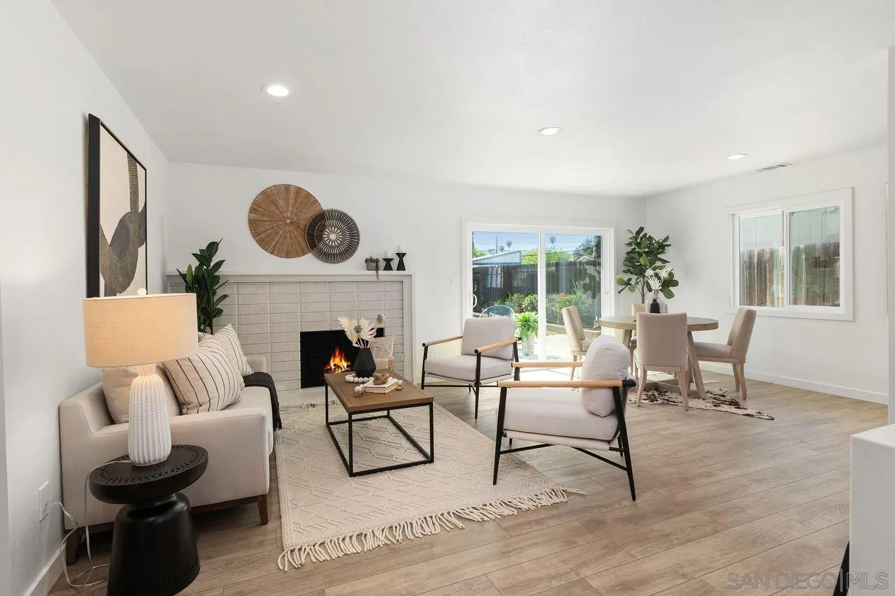 12914 Morene Street Poway, CA 92064 - Photo 2 of 40 a living room with furniture and a fireplace