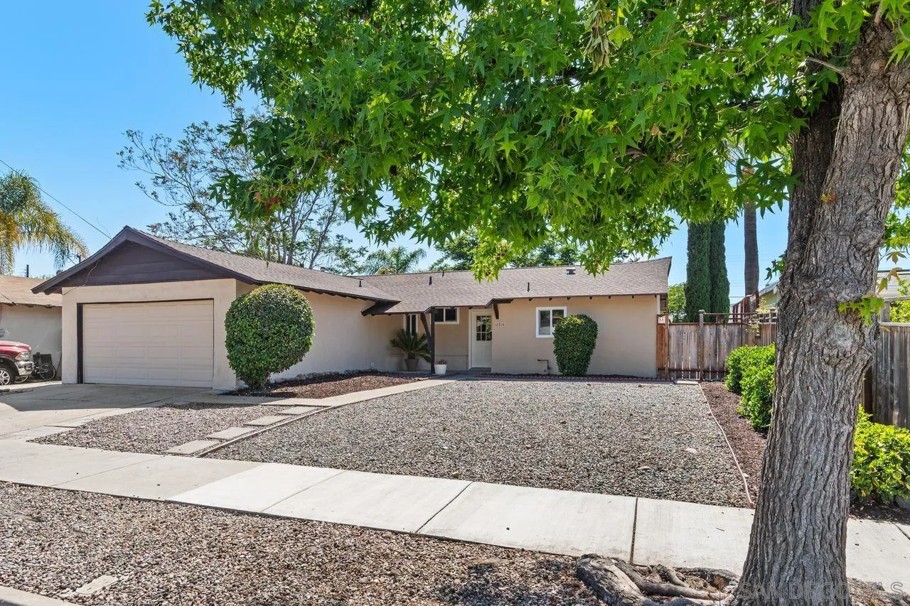 12914 Morene Street Poway, CA 92064 - Photo 38 of 40 a house that has a tree in front of it
