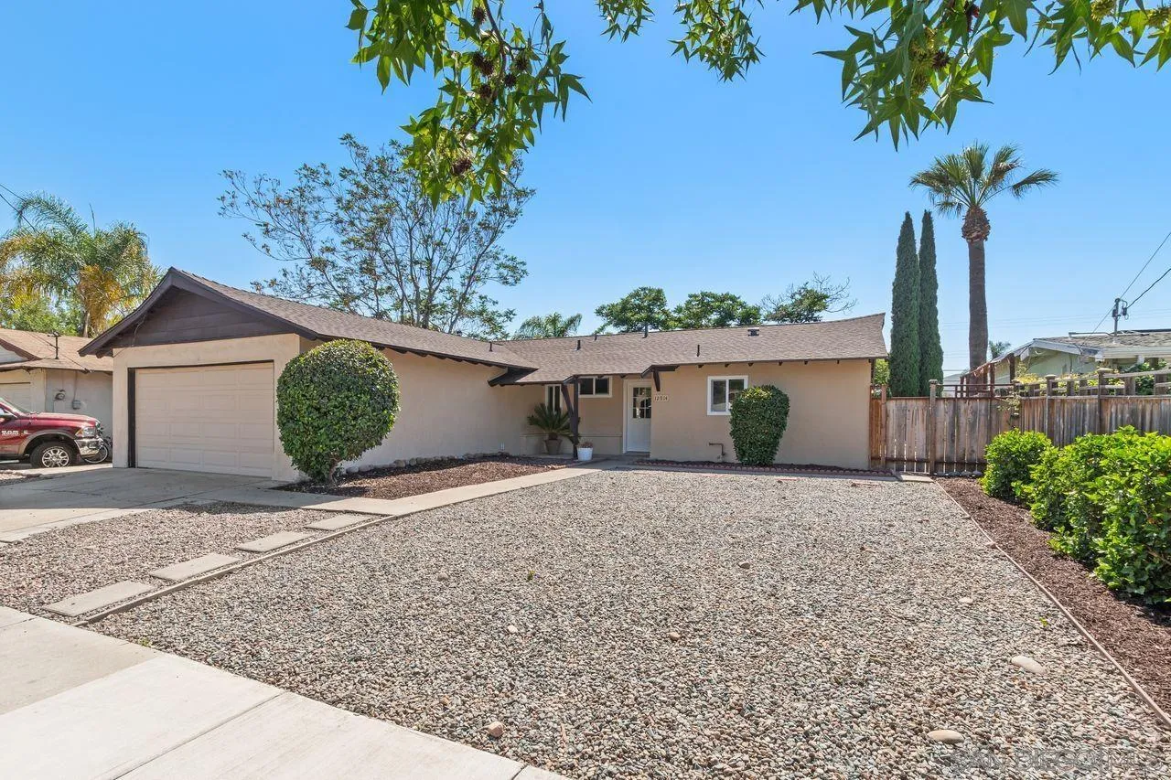 12914 Morene Street Poway, CA 92064 - Photo 39 of 40 a view of a house with palm trees