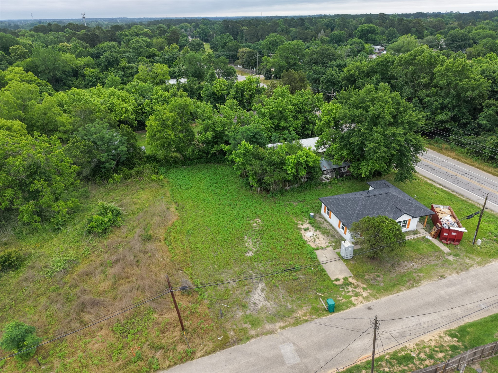 0 Mill Street Willis, TX 77378 - Photo 4 of 24 a view of a garden with an outdoor space