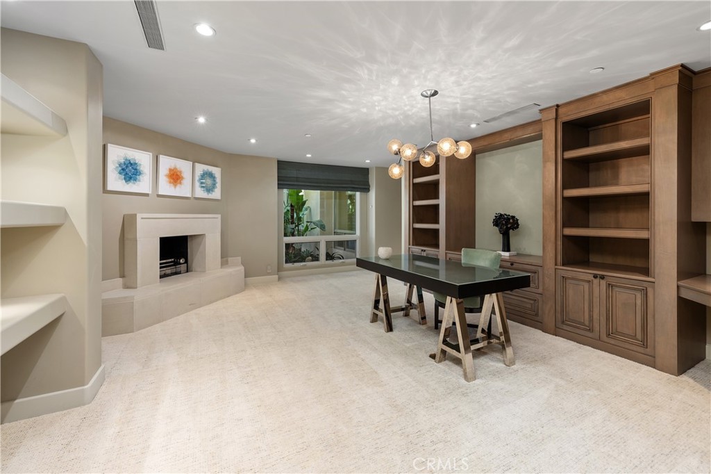 6533 Lago Lindo Rancho Santa Fe, CA 92067 - Photo 27 of 57 a view of a livingroom with furniture window and a fireplace