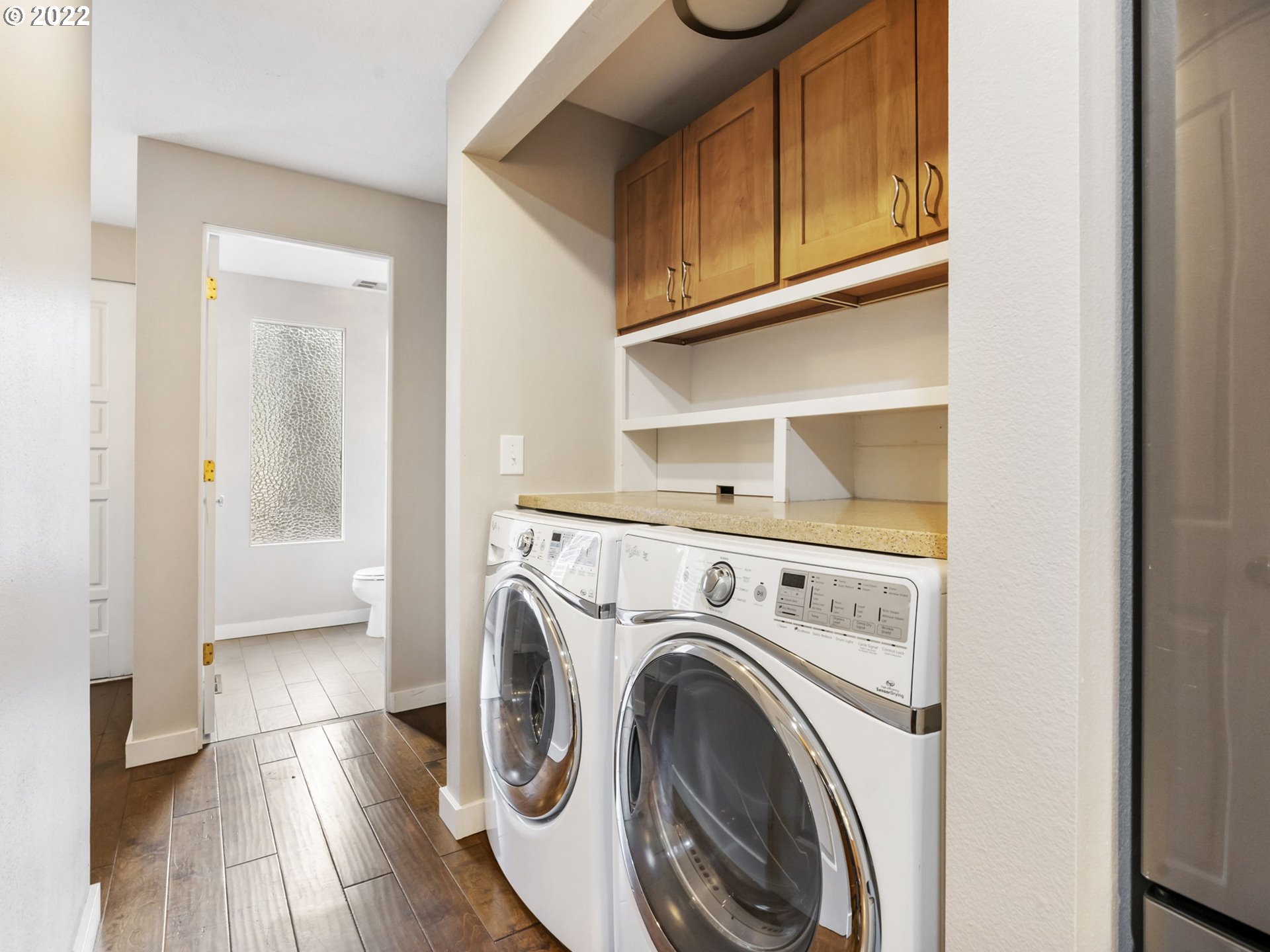 10029 Southwest 52nd Avenue Portland, OR 97219 - Photo 14 of 31 a view of hallway with washer and dryer