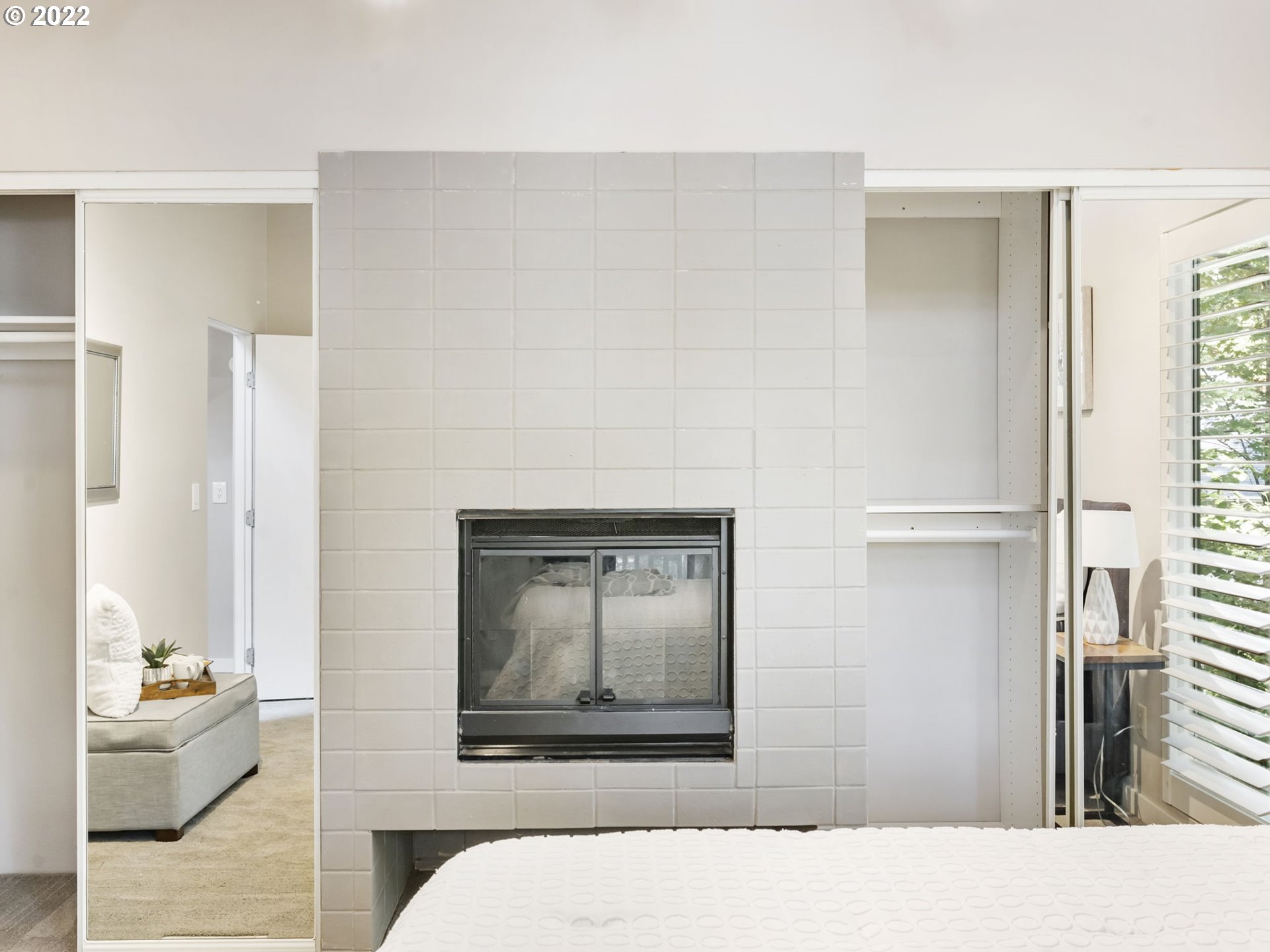 10029 Southwest 52nd Avenue Portland, OR 97219 - Photo 20 of 31 a living room with a bed and furniture