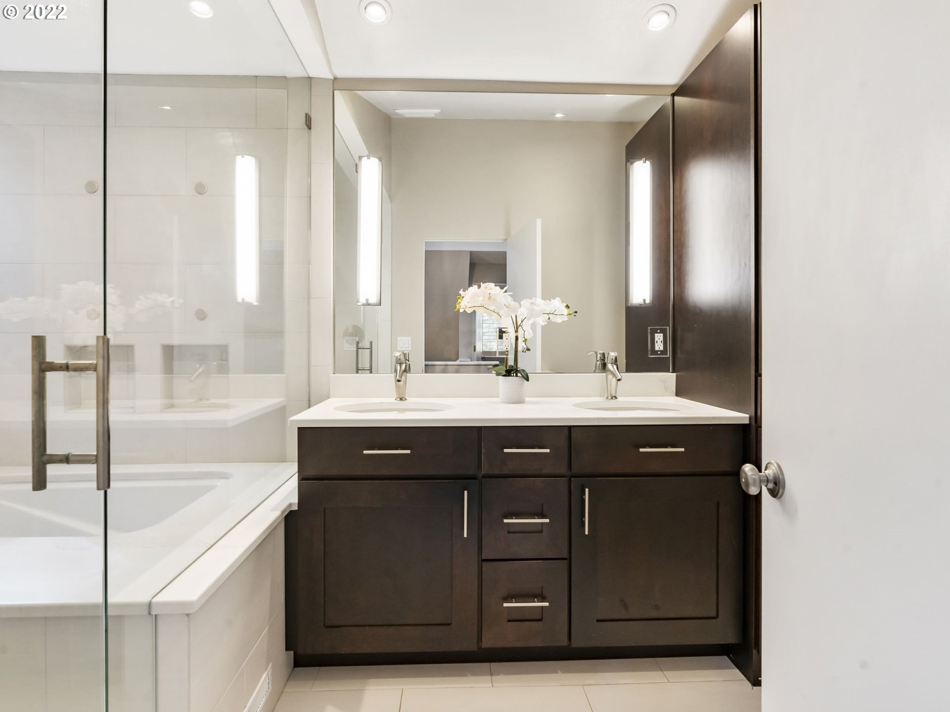 10029 Southwest 52nd Avenue Portland, OR 97219 - Photo 22 of 31 a bathroom with a sink and a mirror