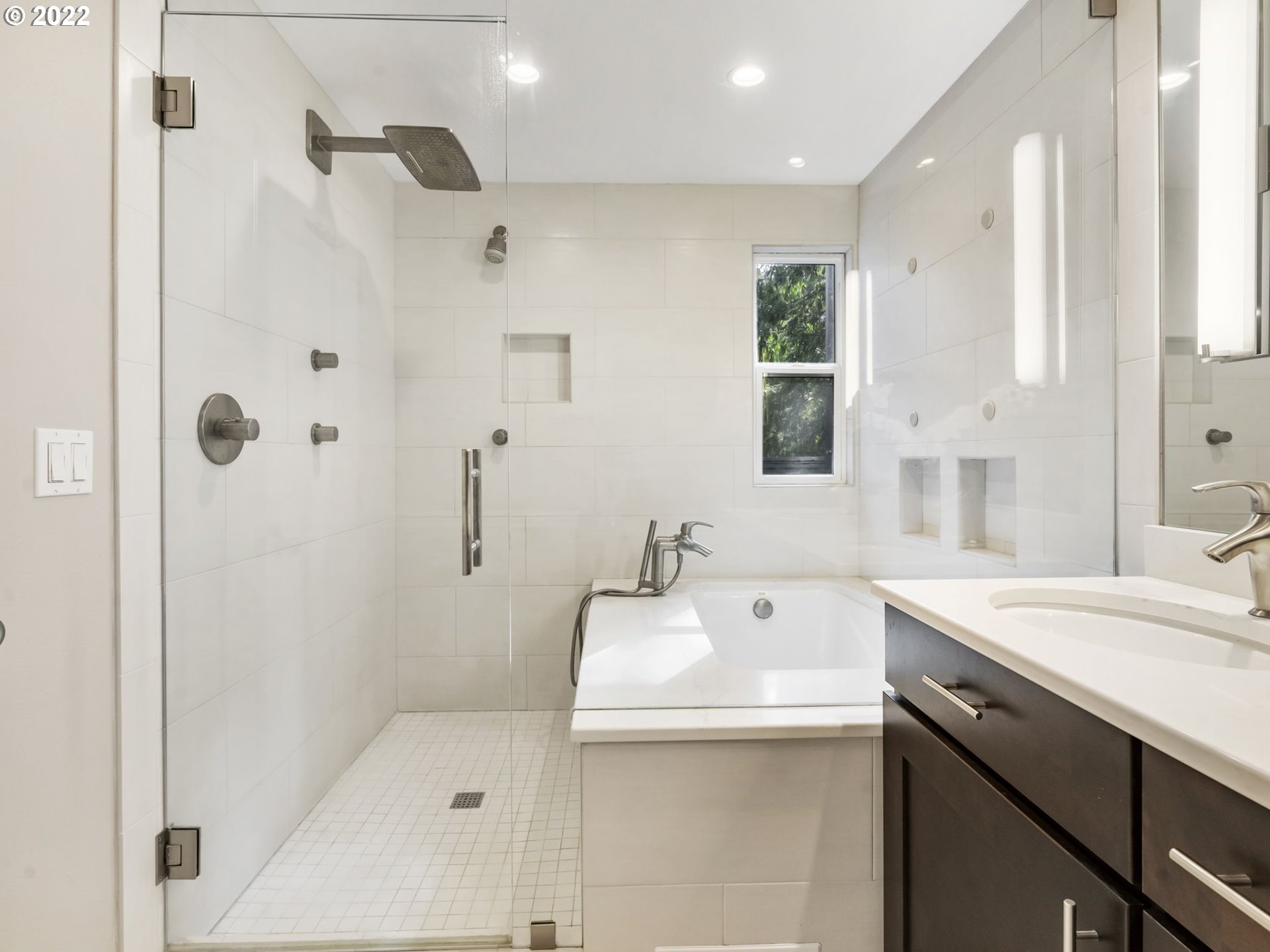 10029 Southwest 52nd Avenue Portland, OR 97219 - Photo 23 of 31 a bathroom with a sink a toilet and shower