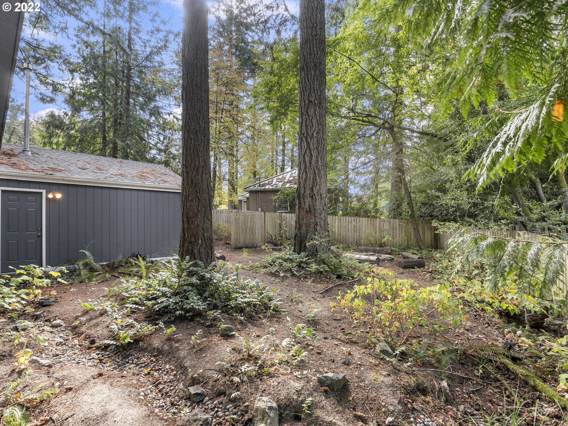 10029 Southwest 52nd Avenue Portland, OR 97219 - Photo 29 of 31 a backyard of a house