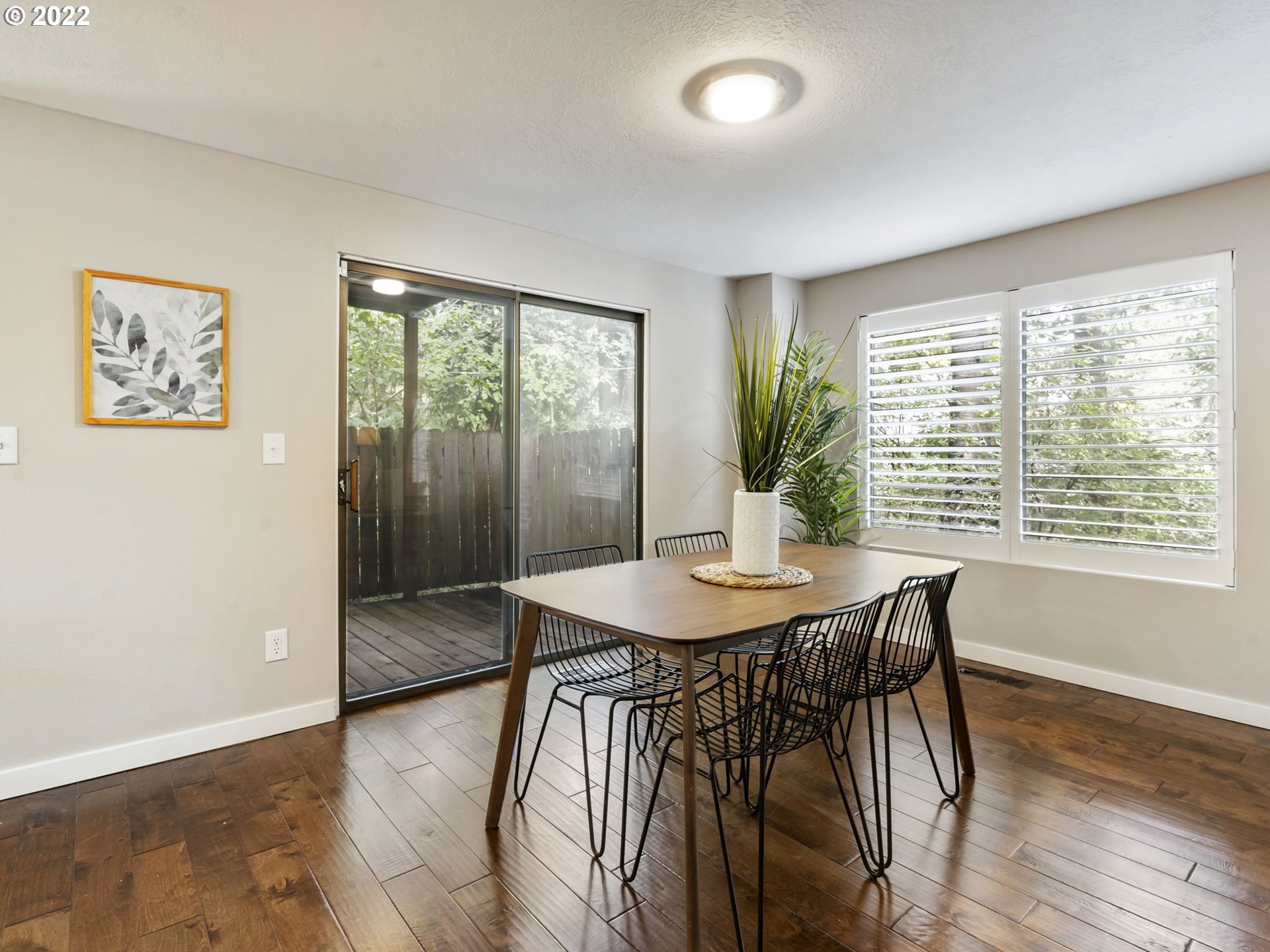 10029 Southwest 52nd Avenue Portland, OR 97219 - Photo 8 of 31 a view of a dining room with furniture and window