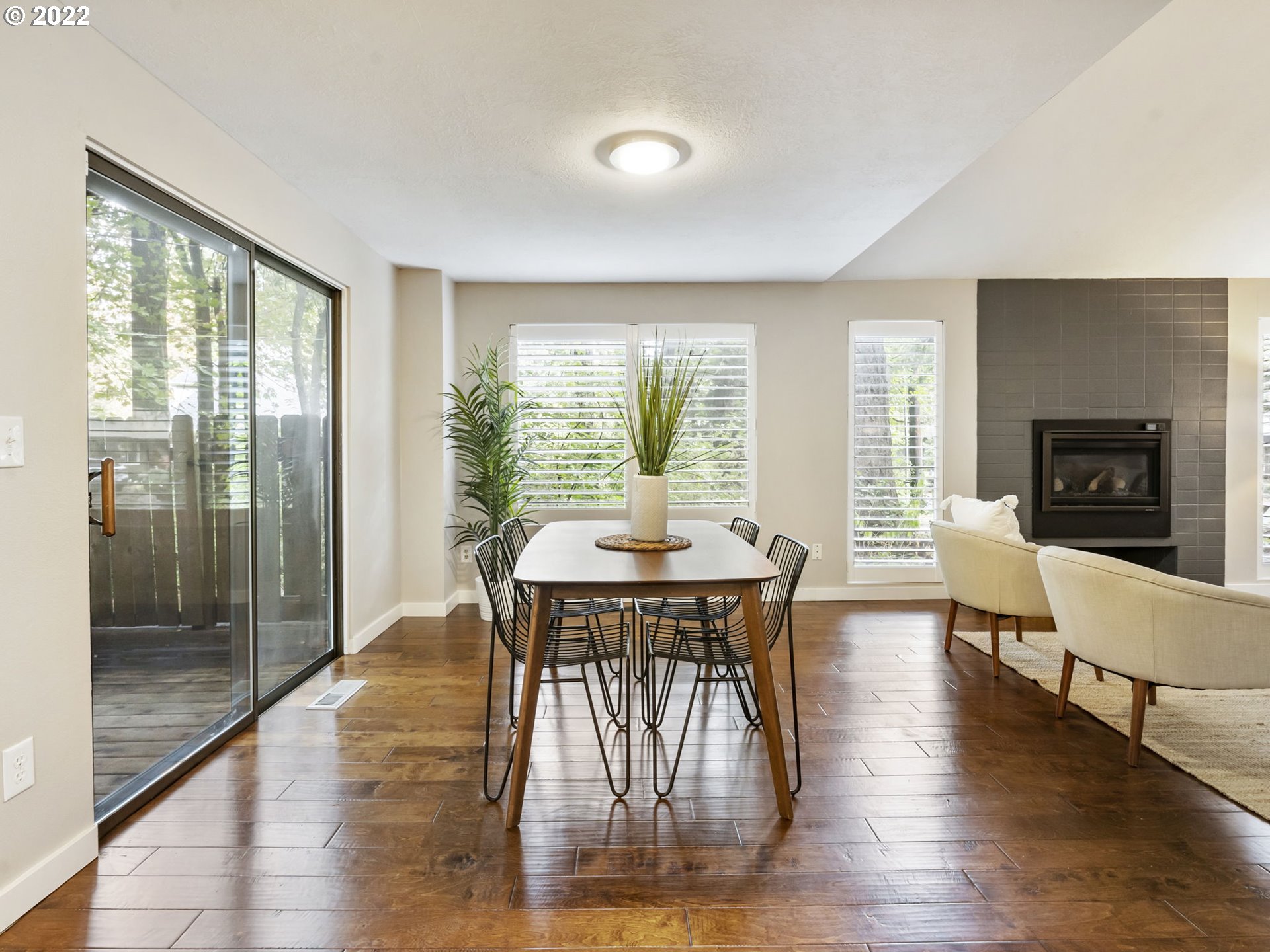 10029 Southwest 52nd Avenue Portland, OR 97219 - Photo 9 of 31 a view of a dining room with furniture window and wooden floor
