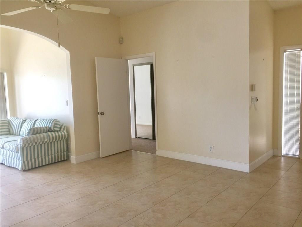 10116 Country Brook Road Boca Raton, FL 33428 - Photo 8 of 34 a view of an empty room and glass window