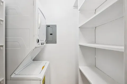 a bathroom with a tub and sink