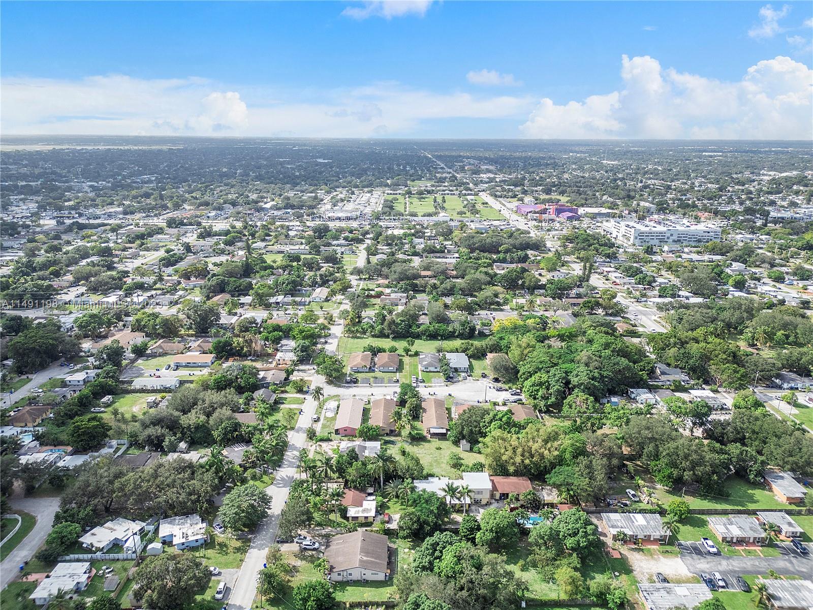 5709 McKinley Street Hollywood, FL 33021 - Photo 19 of 33 an aerial view of multiple house