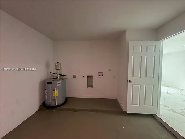 a view of empty room with closet