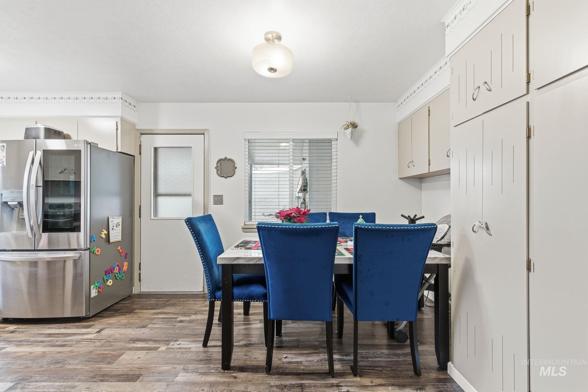 4426 West Clark Street Boise, ID 83705 - Photo 12 of 43 Dining area with light wood-style flooring