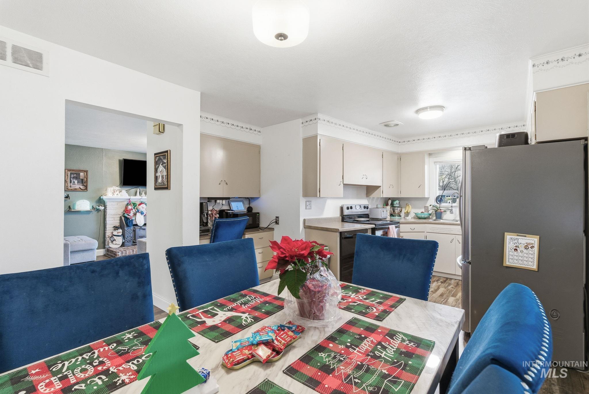 4426 West Clark Street Boise, ID 83705 - Photo 14 of 43 Dining room featuring wood finished floors
