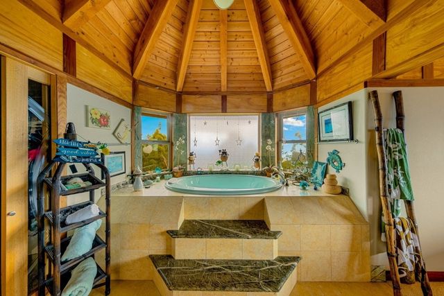 a view of a house with backyard