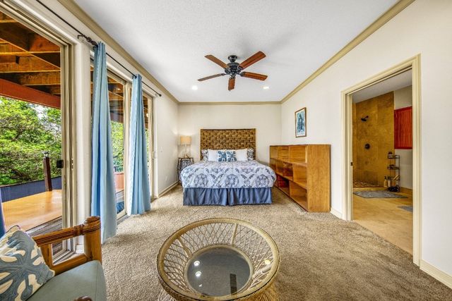 a view of a bathroom with a sink and a mirror