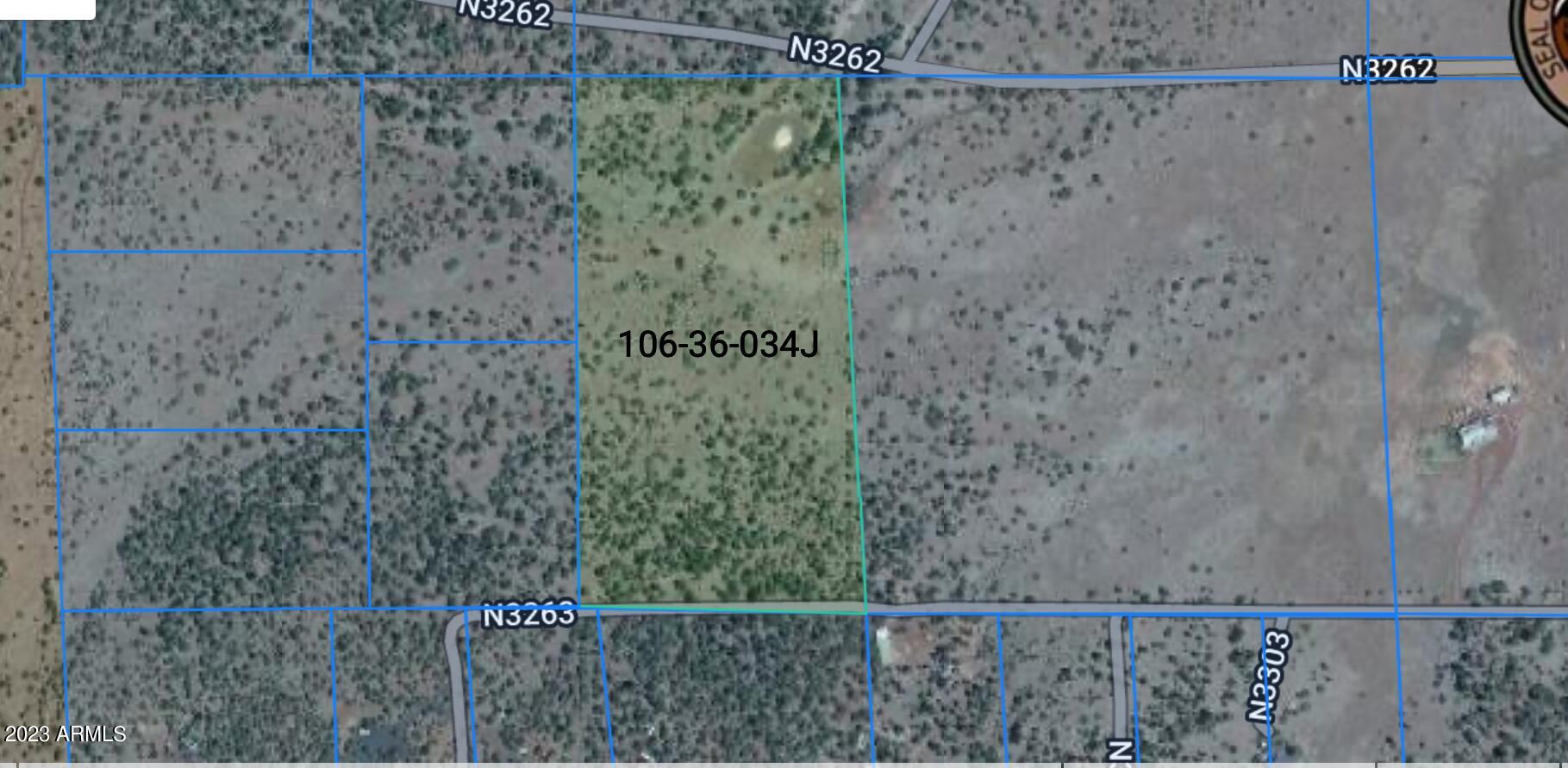 N3263 Parcel 1, Unit 34 Vernon, AZ 85940 - Photo 8 of 8 a view of a pathway close to a wall