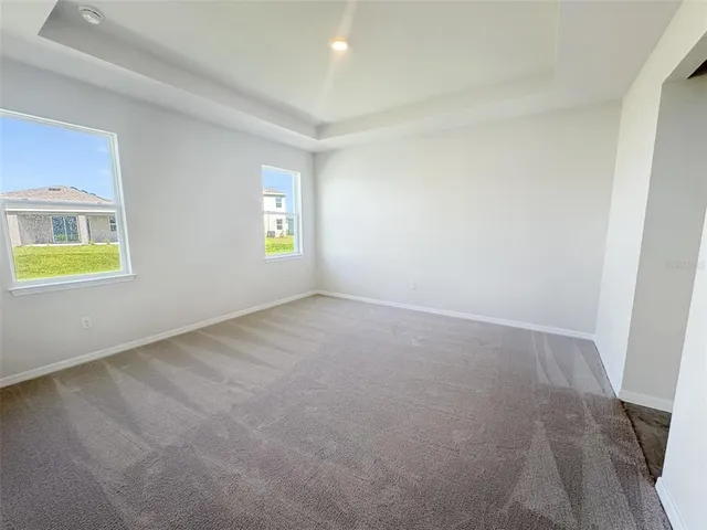 a bathroom with a granite countertop sink mirror and double