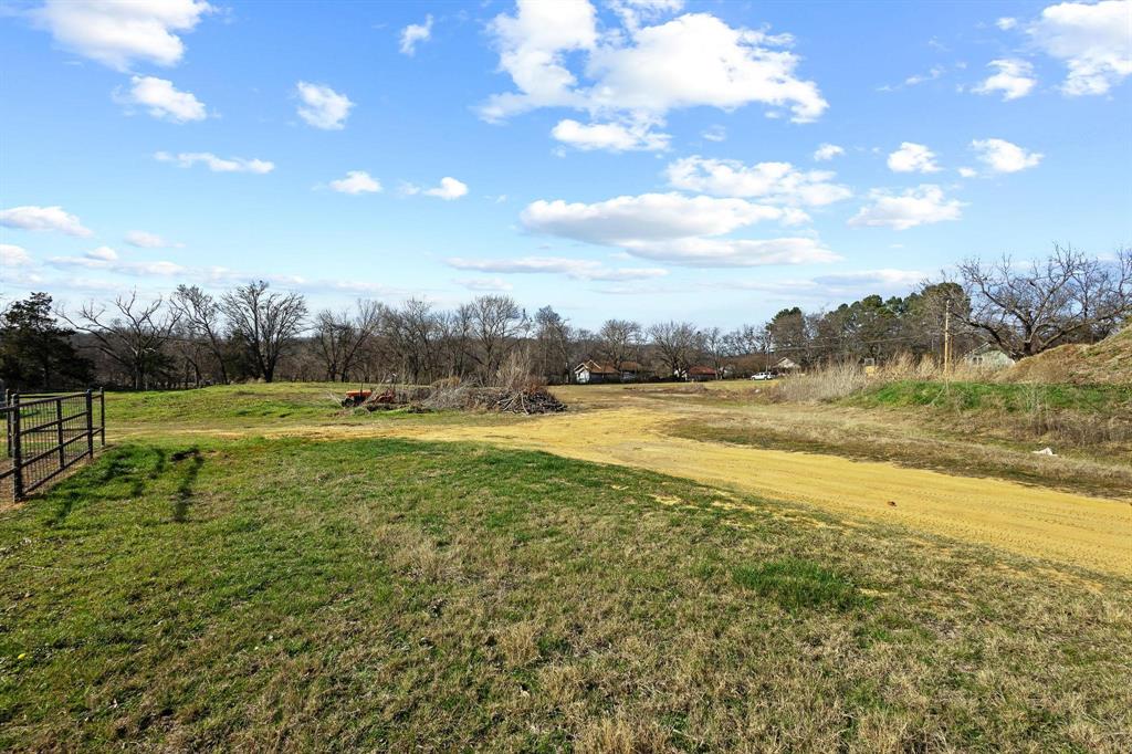 Tbd East Texas Street Denison, TX 75021 - Photo 8 of 31 a view of a golf course with a lake
