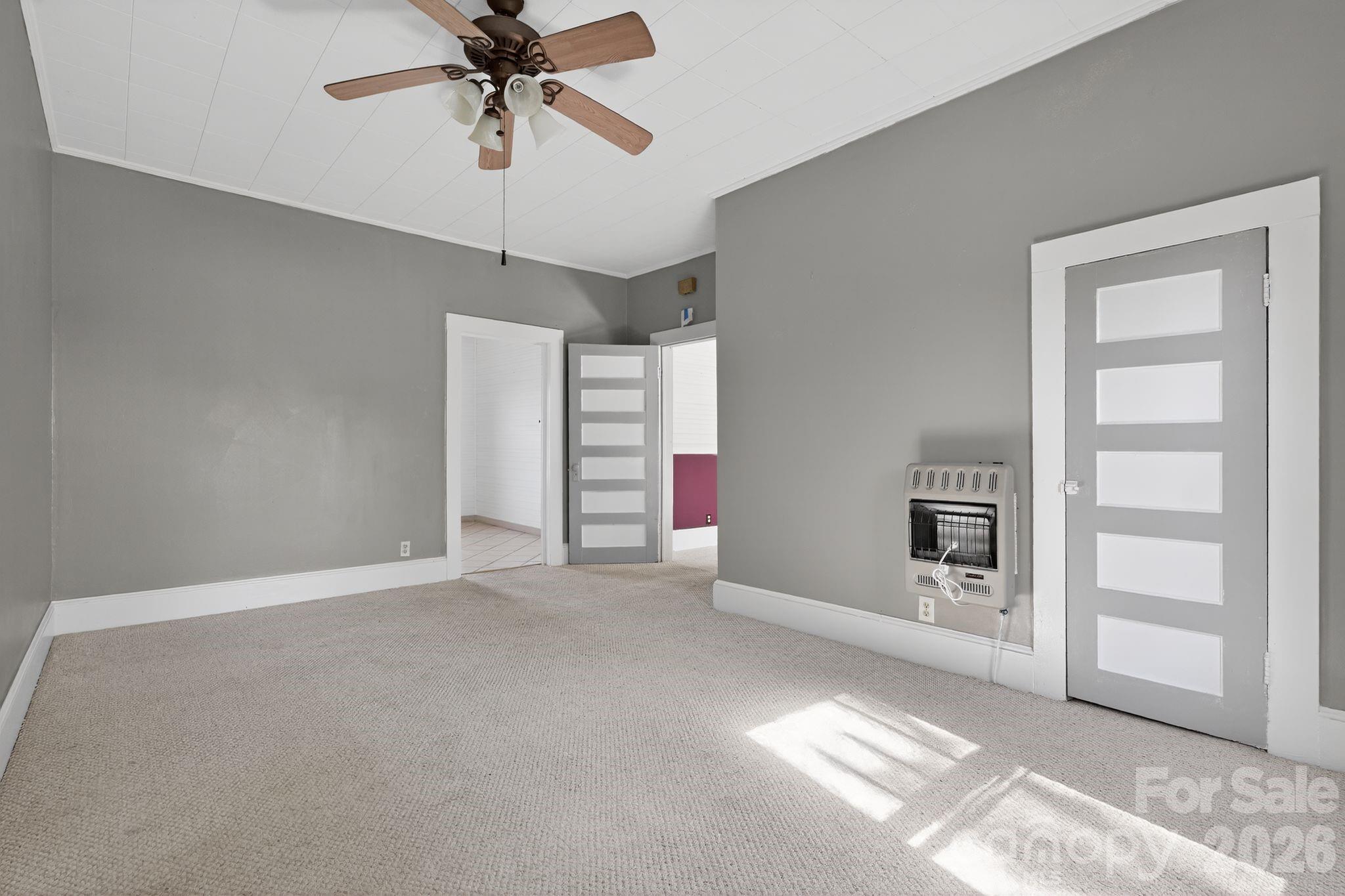 137 Duke Street Granite Falls, NC 28630 - Photo 12 of 16 a view of an empty room with a window