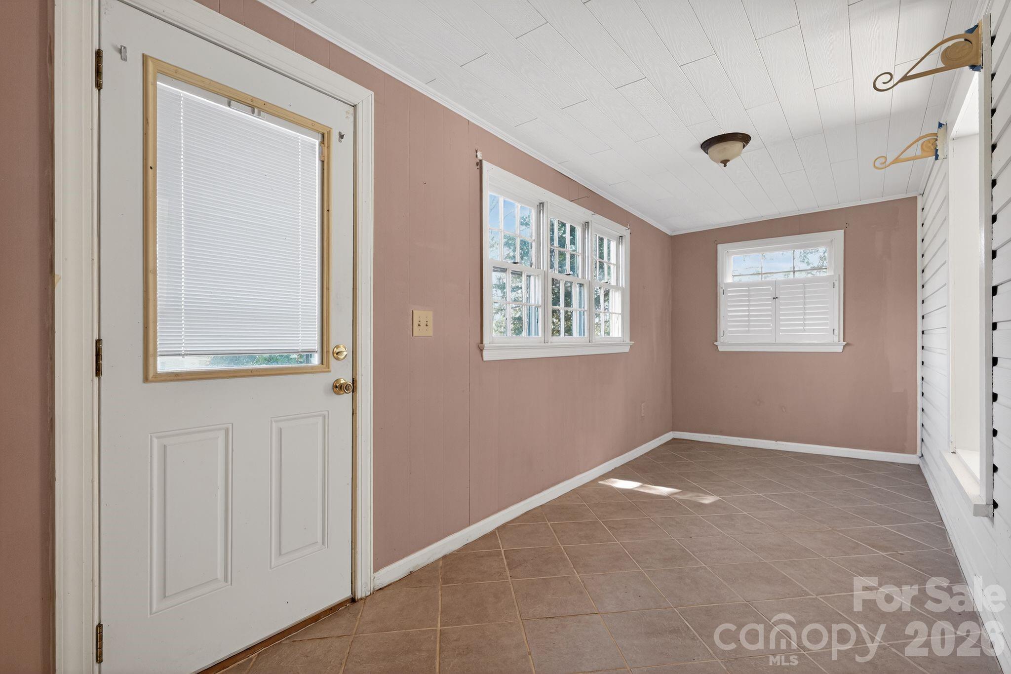 137 Duke Street Granite Falls, NC 28630 - Photo 14 of 16 a view of an empty room with closet and a window