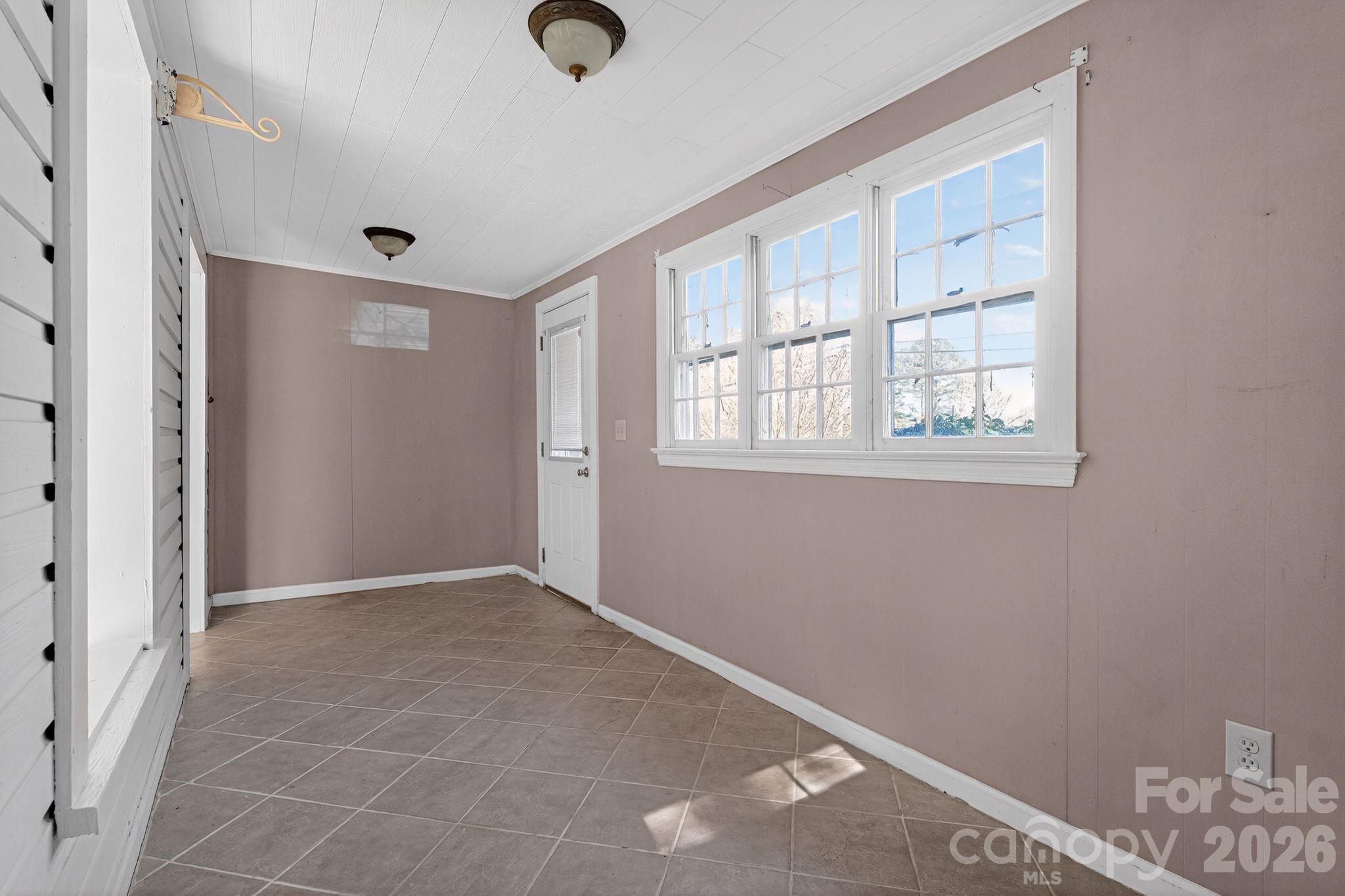 137 Duke Street Granite Falls, NC 28630 - Photo 15 of 16 an empty room with windows