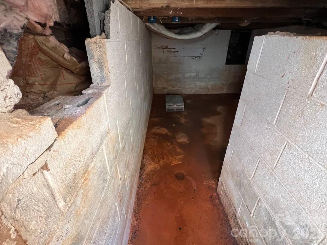 137 Duke Street Granite Falls, NC 28630 - Photo 16 of 16 a close view of water heater room