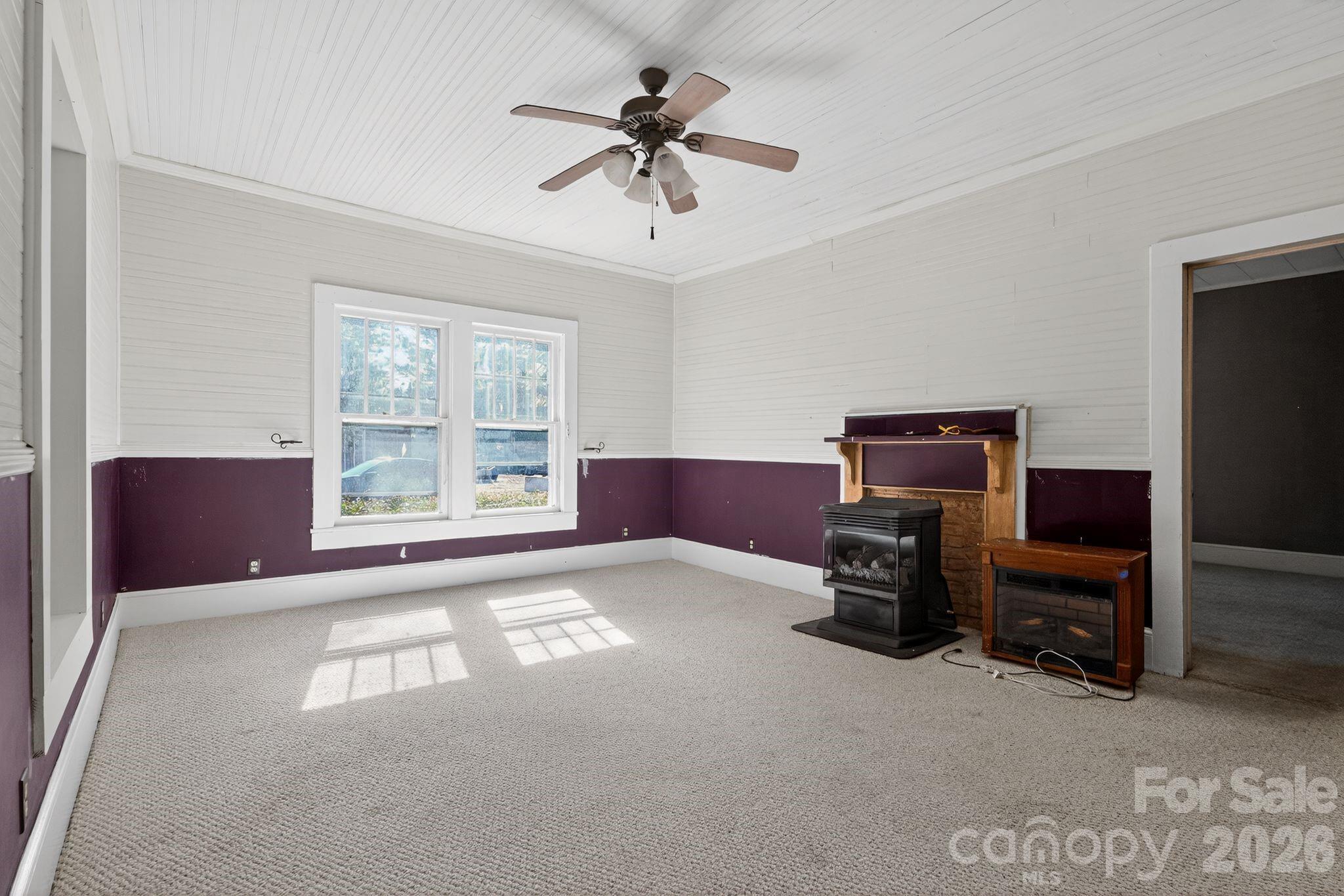 137 Duke Street Granite Falls, NC 28630 - Photo 6 of 16 a view of workspace with furniture and a window