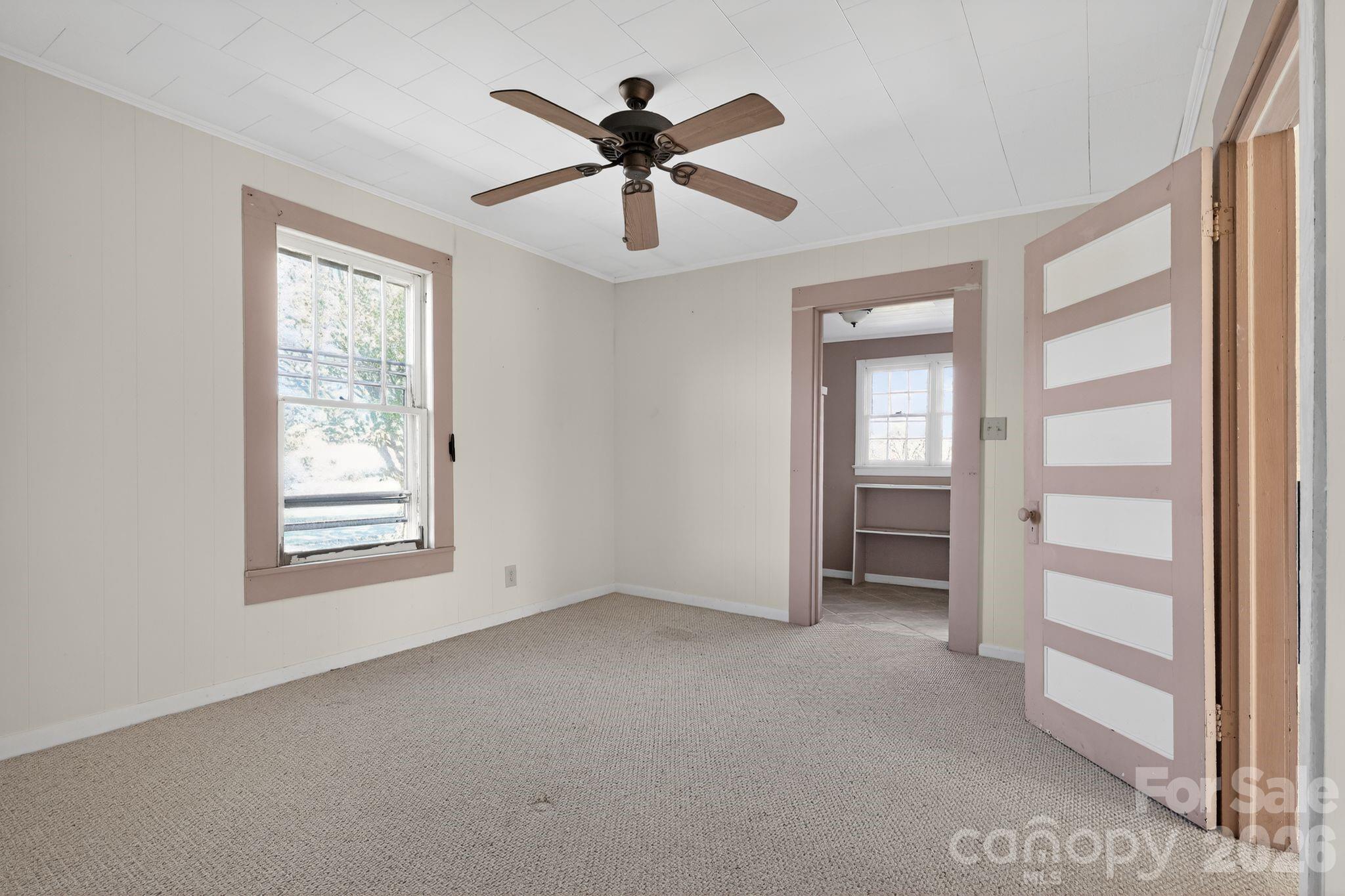 137 Duke Street Granite Falls, NC 28630 - Photo 8 of 16 a view of an empty room with a window