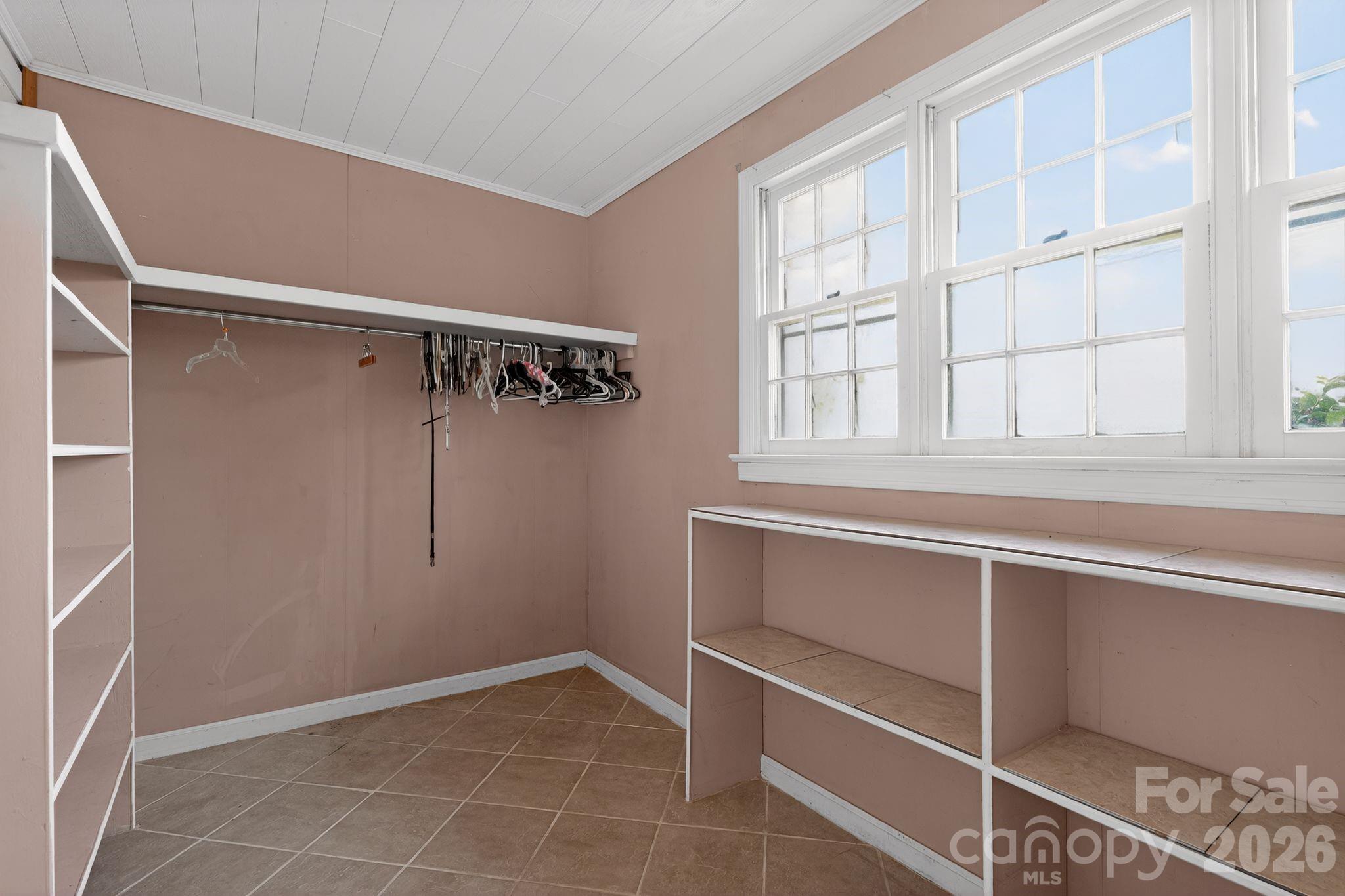 137 Duke Street Granite Falls, NC 28630 - Photo 9 of 16 a view of walk in closet with empty racks