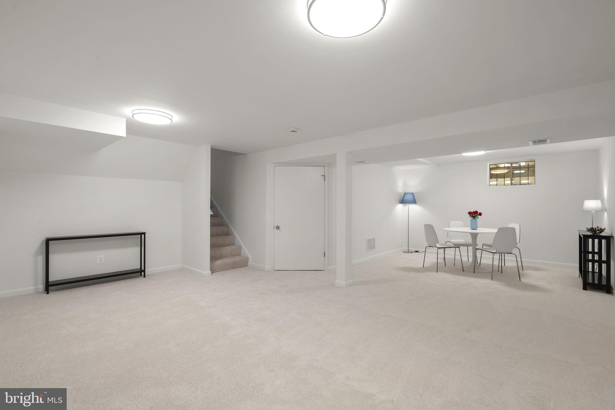 12500 Parkton Street Fort Washington, MD 20744 - Photo 19 of 29 Expansive rec room for media or play
