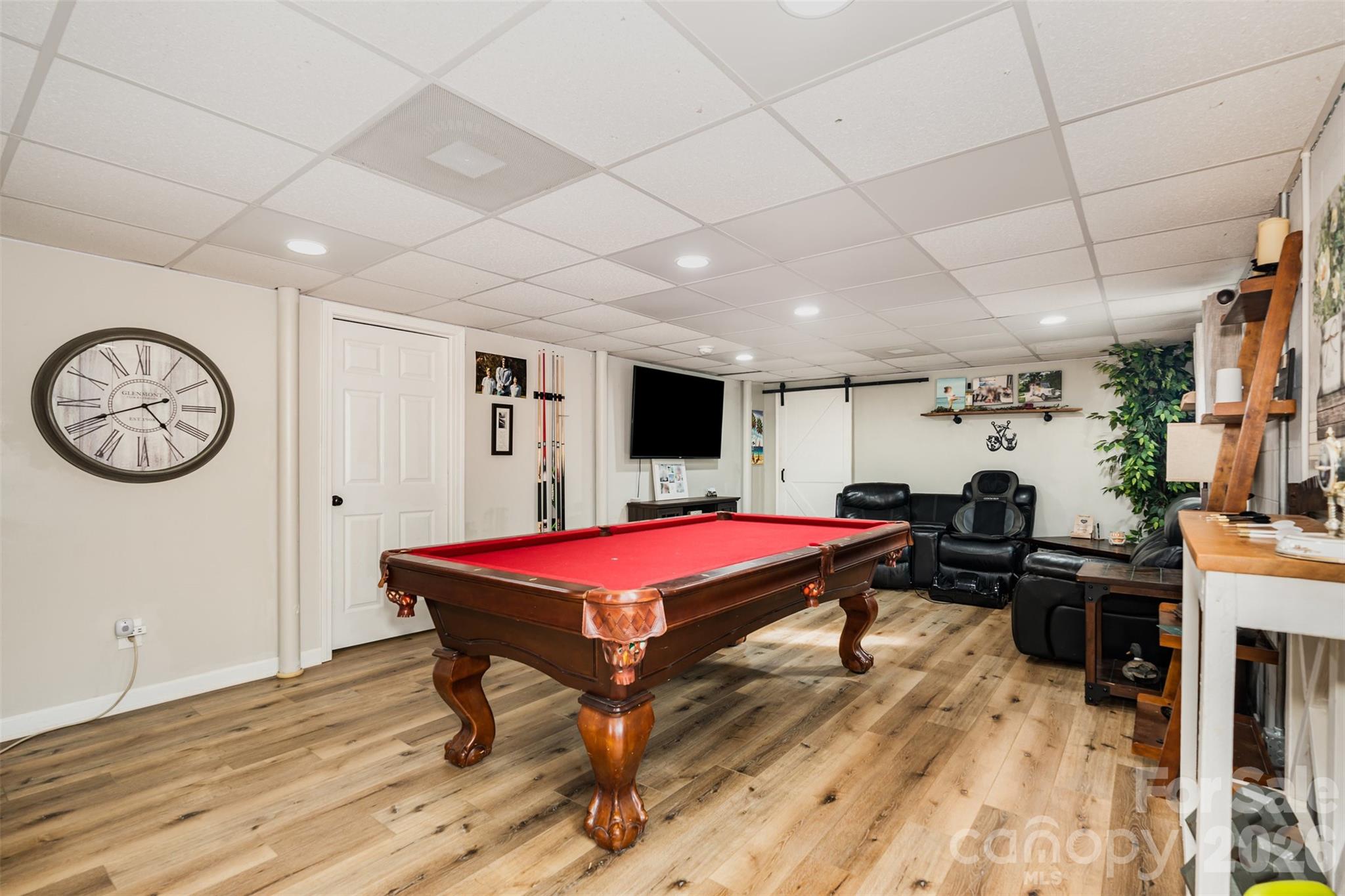 197 Sain Road Statesville, NC 28625 - Photo 26 of 44 a living room with a table tennis pool table and chairs