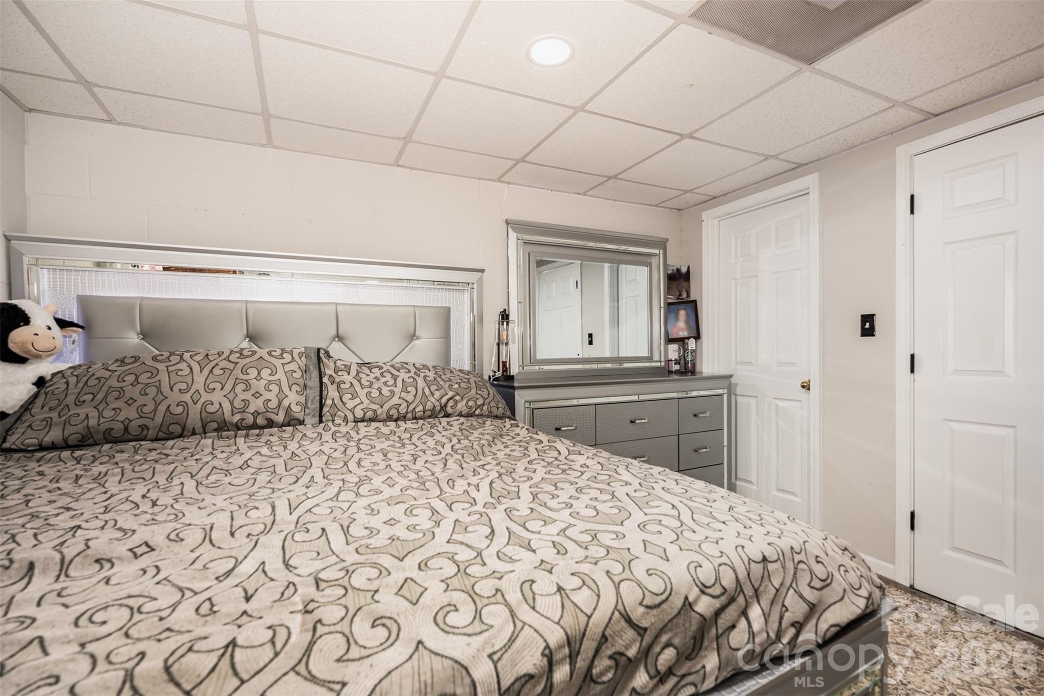 197 Sain Road Statesville, NC 28625 - Photo 27 of 44 a large bed sitting in a bedroom and dressers