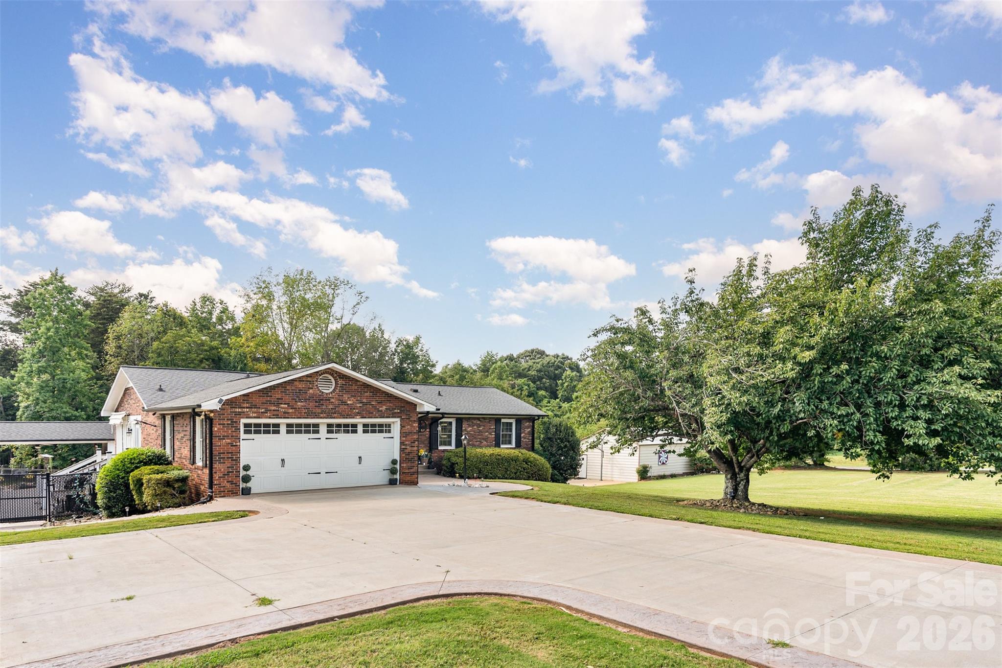 197 Sain Road Statesville, NC 28625 - Photo 3 of 44 a front view of a house with a yard