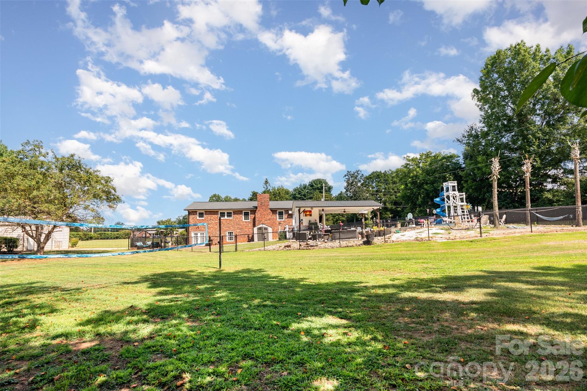 197 Sain Road Statesville, NC 28625 - Photo 41 of 44 a view of a swimming pool with a garden