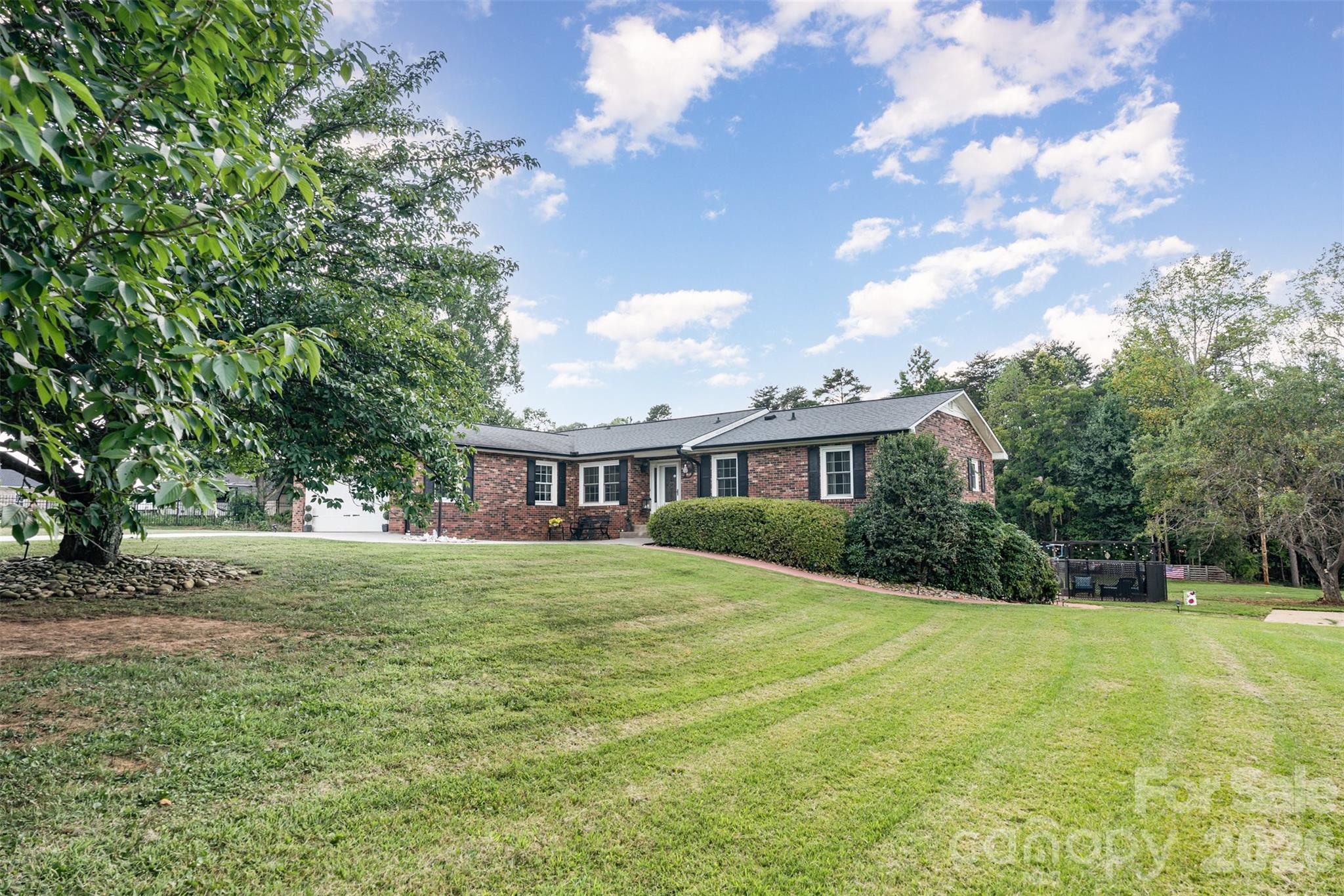 197 Sain Road Statesville, NC 28625 - Photo 7 of 44 a front view of house with yard and trees