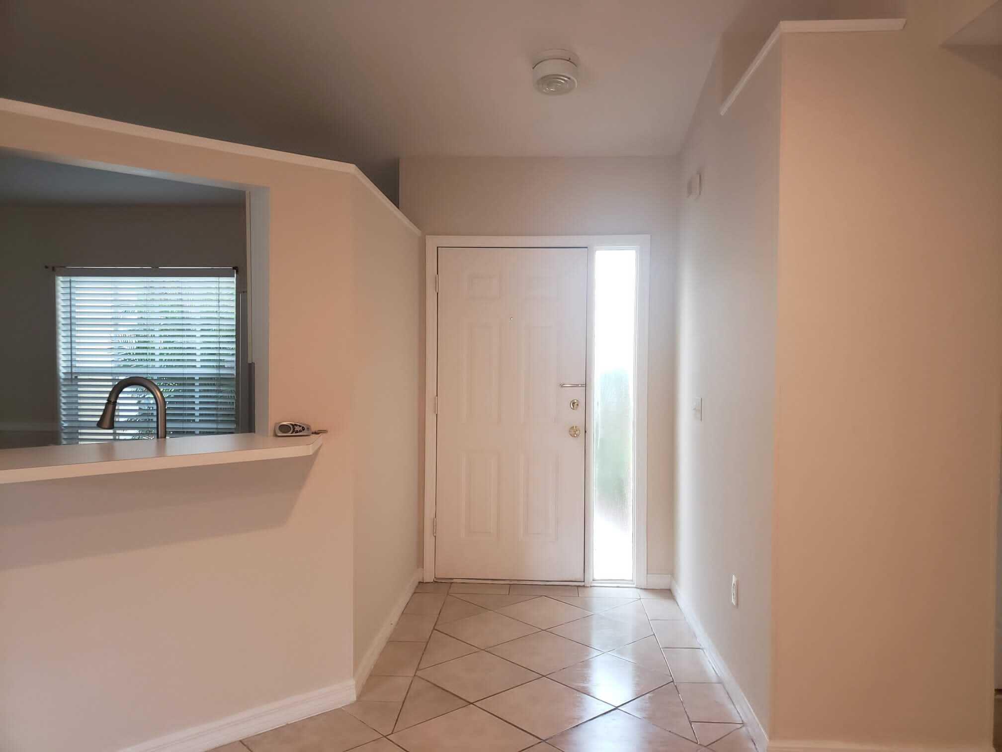 3409 12th Street Southwest Vero Beach, FL 32968 - Photo 15 of 26 a view of a sink and a mirror