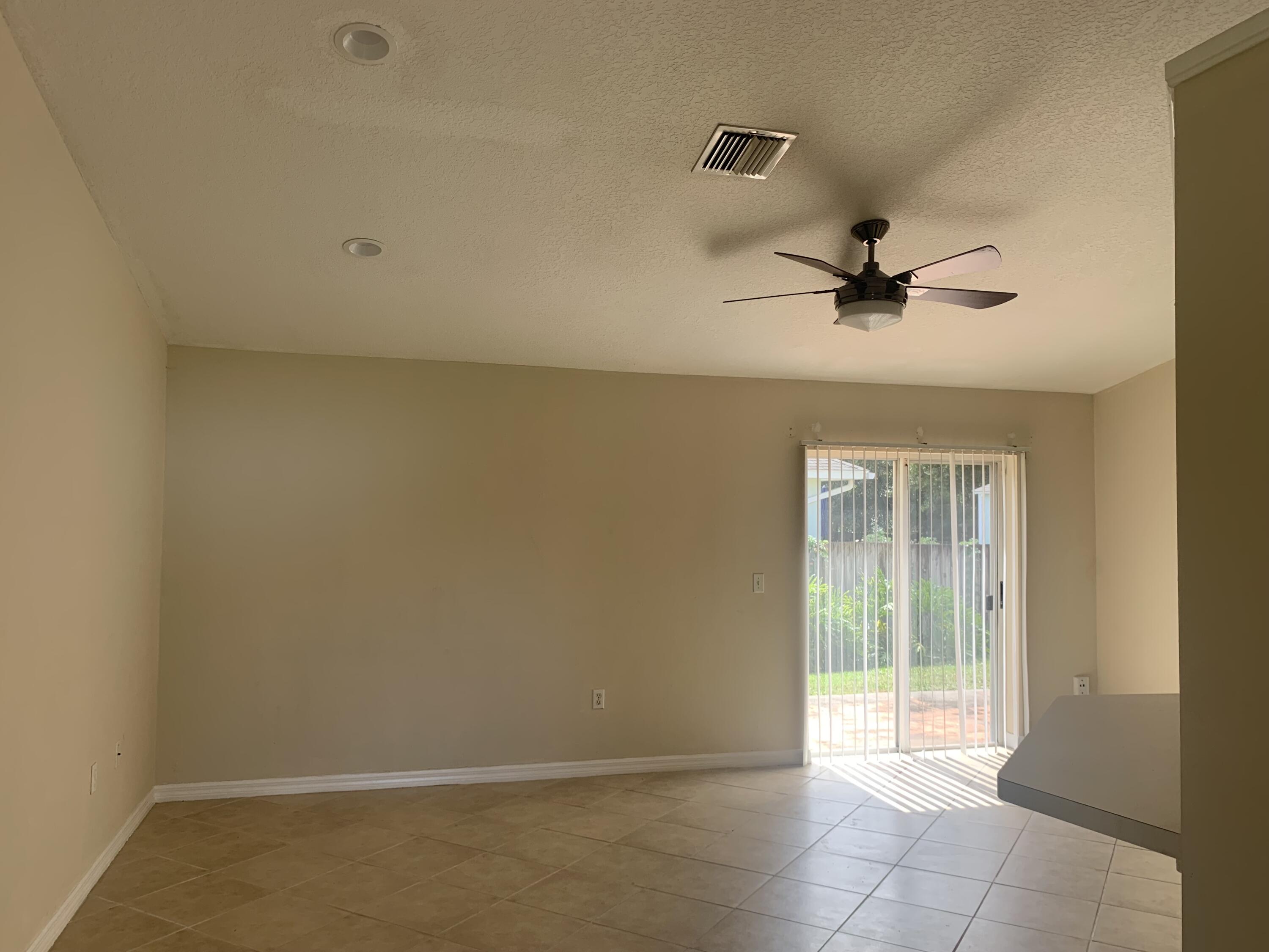 3409 12th Street Southwest Vero Beach, FL 32968 - Photo 16 of 26 a view of an empty room