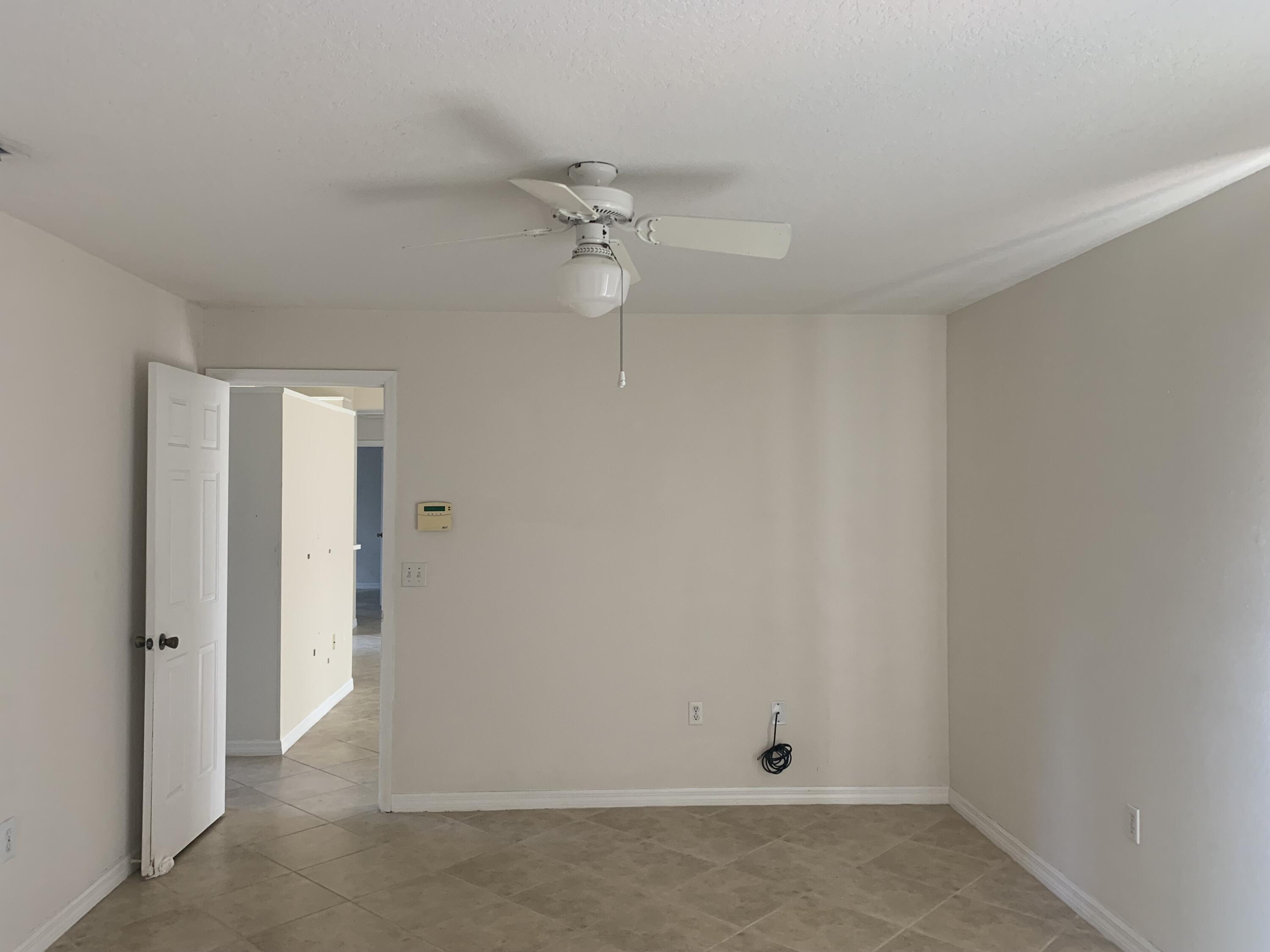 3409 12th Street Southwest Vero Beach, FL 32968 - Photo 18 of 26 wooden floor in an empty room
