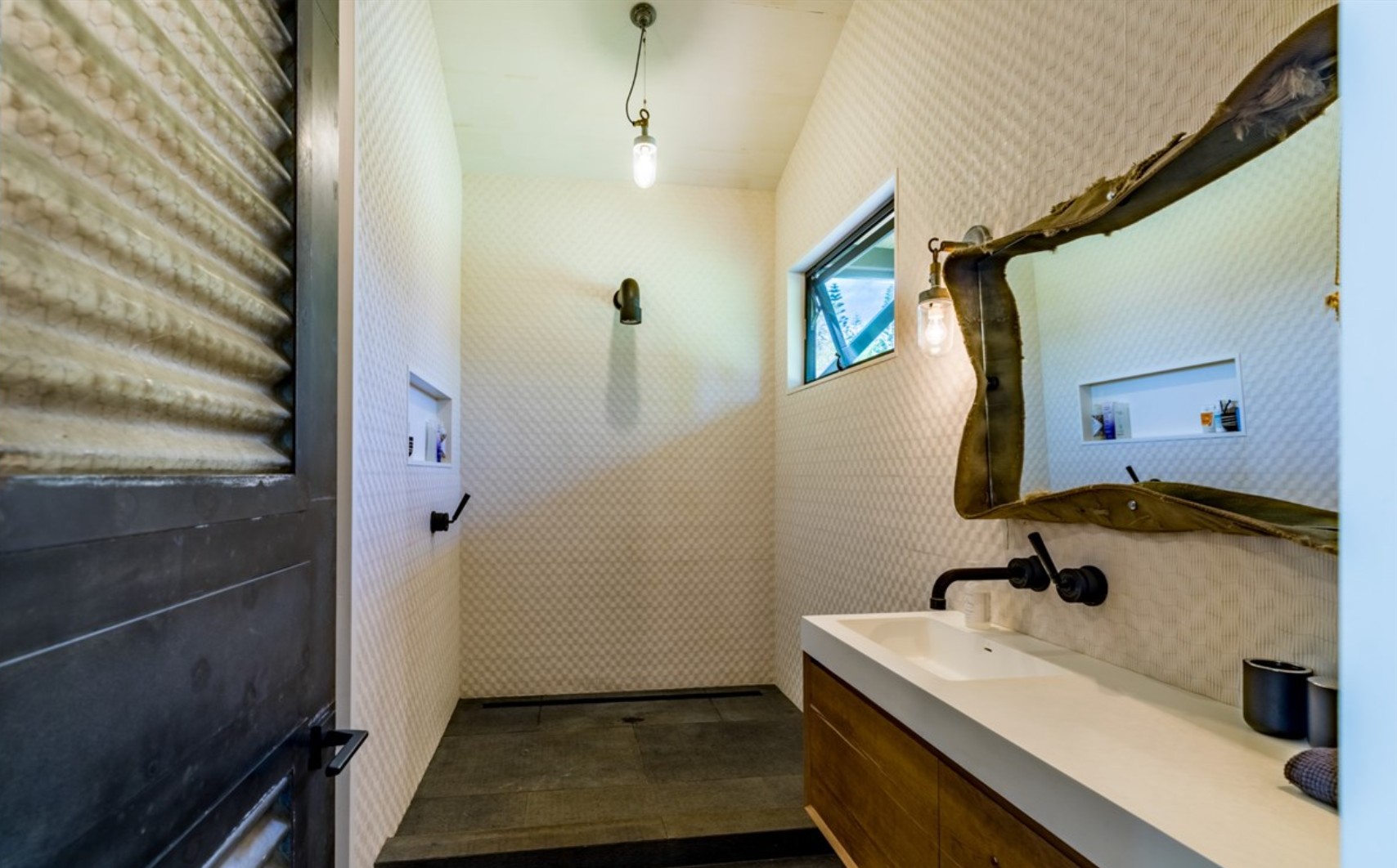 2671 Kauapea Road Kilauea, HI 96754 - Photo 18 of 30 a bathroom with a sink and a mirror