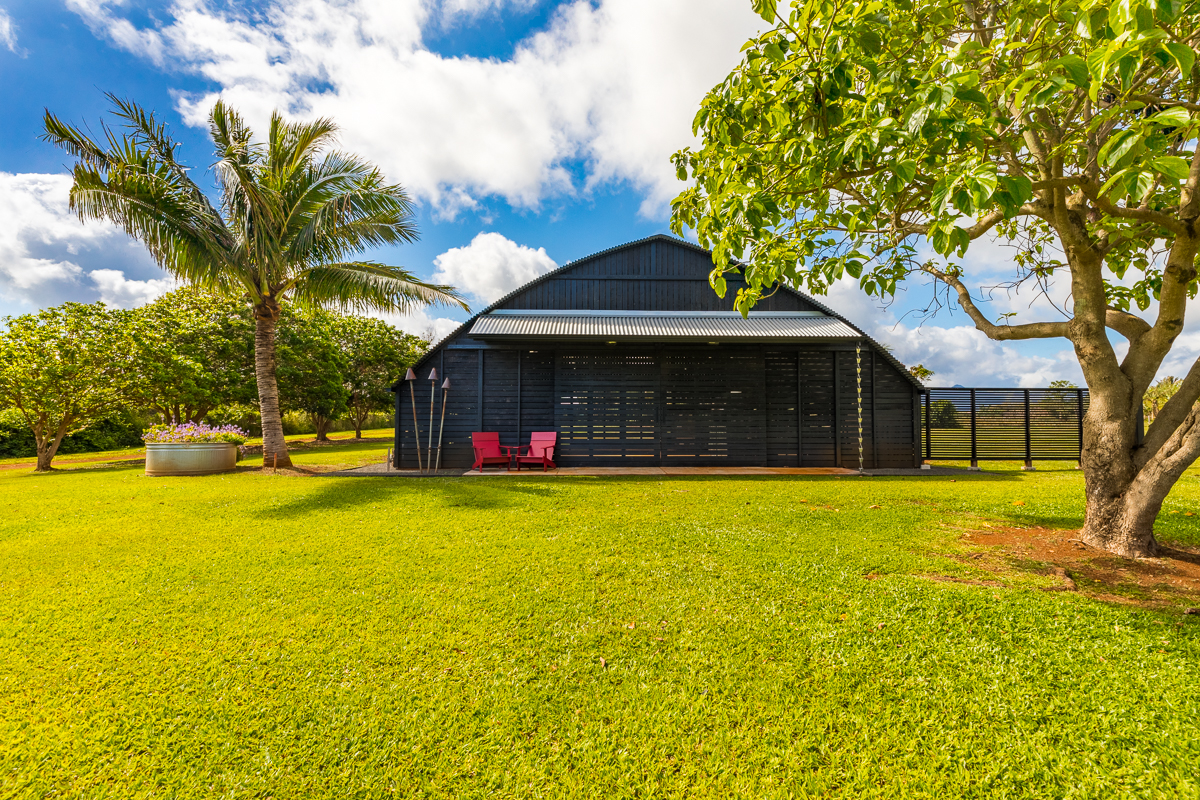 2671 Kauapea Road Kilauea, HI 96754 - Photo 29 of 30 a swimming pool with outdoor seating and yard