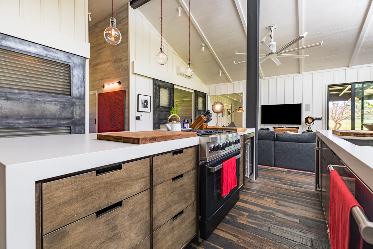 2671 Kauapea Road Kilauea, HI 96754 - Photo 10 of 30 a kitchen with stainless steel appliances a sink and a stove