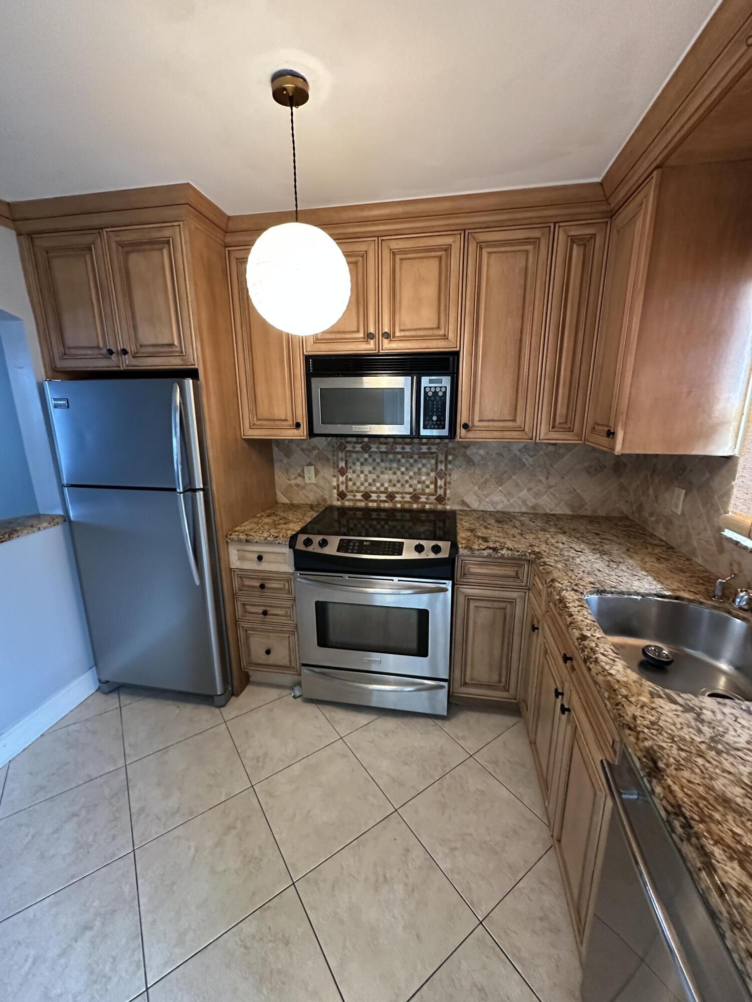 9949 Sandalfoot Boulevard, Unit 533 Boca Raton, FL 33428 - Photo 3 of 15 IMG_9567