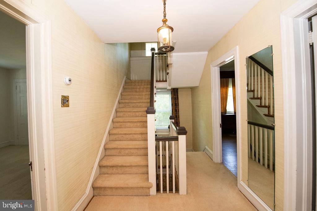103 Waverly Road Wyncote, PA 19095 - Photo 17 of 41 a view of entryway and hall with wooden floor