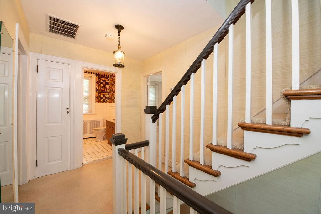 103 Waverly Road Wyncote, PA 19095 - Photo 27 of 41 a view of an entryway with wooden floor and stairs