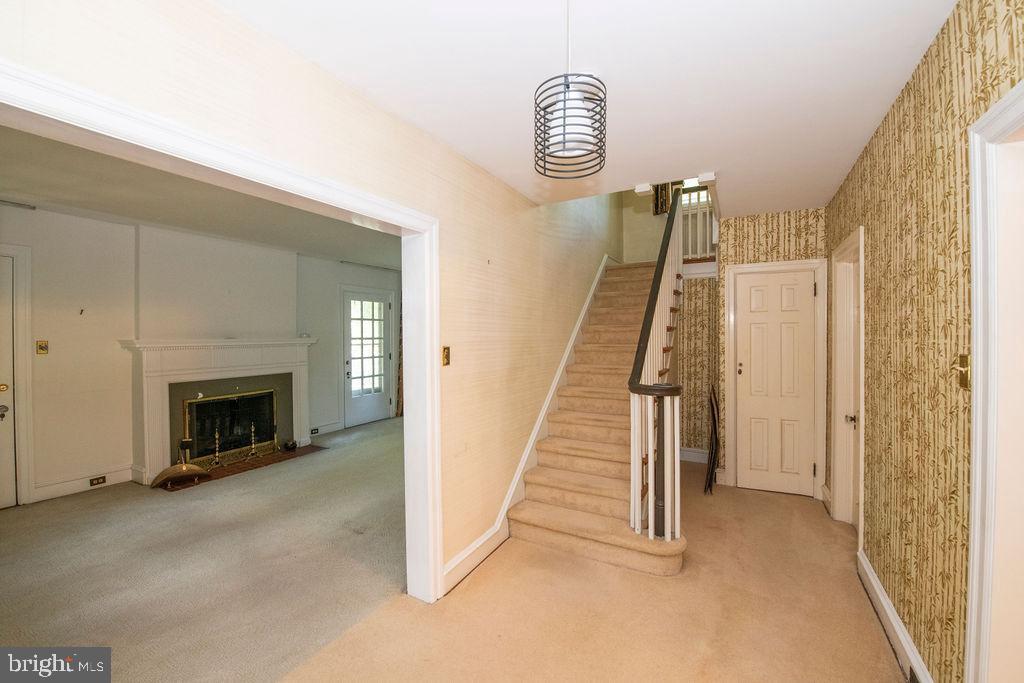 103 Waverly Road Wyncote, PA 19095 - Photo 4 of 41 a view of a livingroom with a fireplace