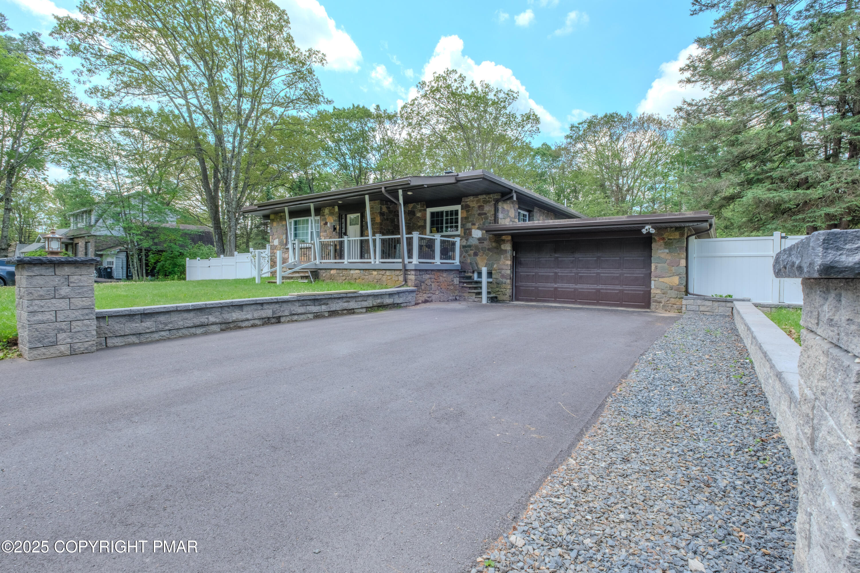 a house with trees in the background